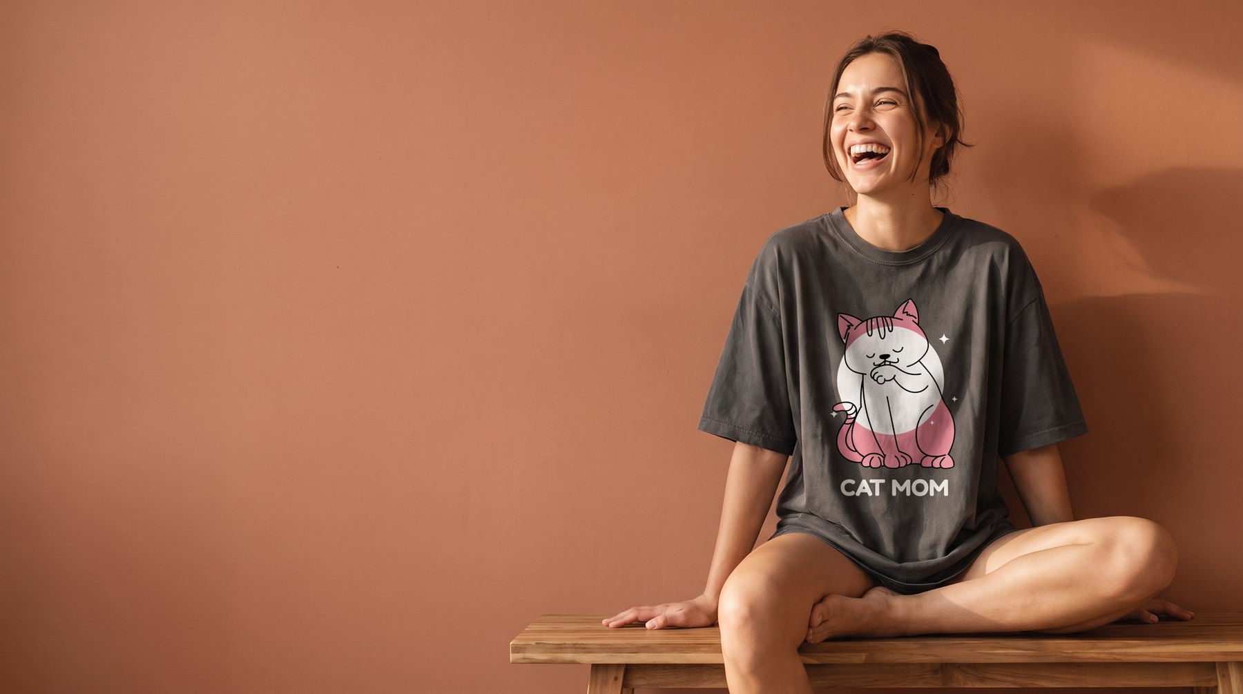 Woman wearing the FilmyArts Cat Mom design t-shirt